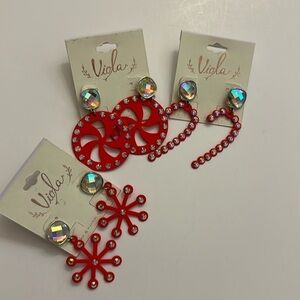 NWT A set of 3 red Christmas earrings with blings.
